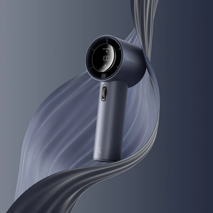 Modern hair dryer with digital display on a gray background