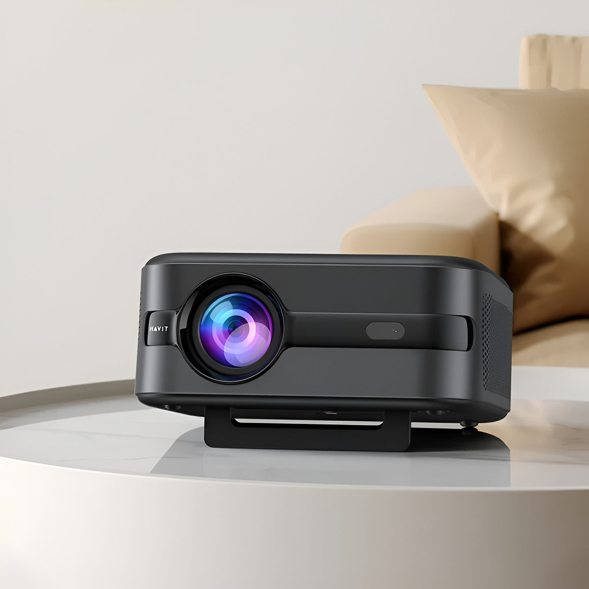 Black projector on a white surface with a blurred background