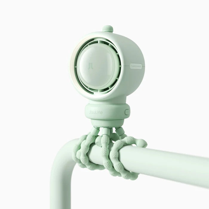 Mint green shower head with flexible arm on a white background