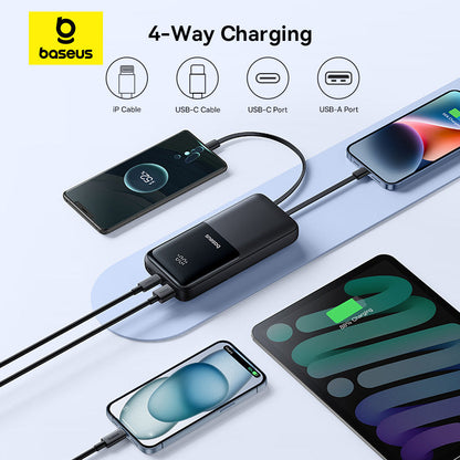 Baseus 4-way charging adapter with four devices connected on a light gray background