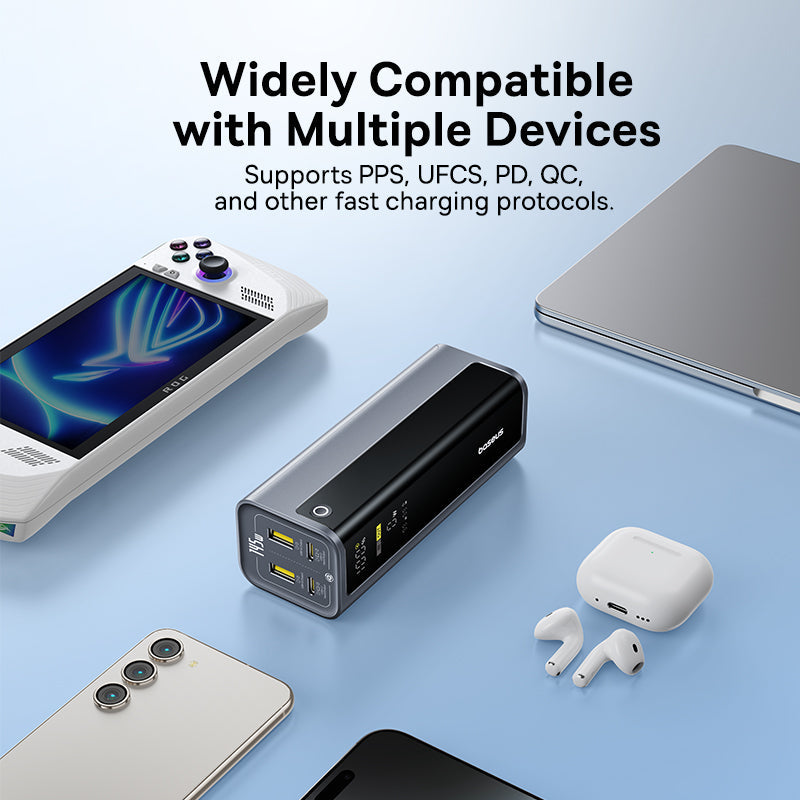 Power bank with smartphone, tablet, laptop, and earbuds on a light blue background