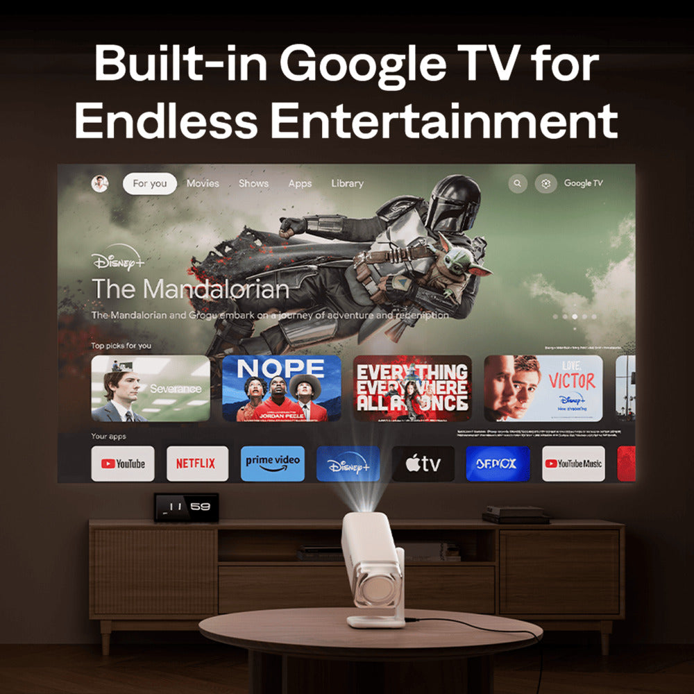 Aurzen Boom Air Portable 1080p Google TV Projector Smart TV with Google TV interface displaying various apps in a home entertainment setup.