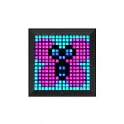 Pixelated face design on a digital display with colorful lighting.
