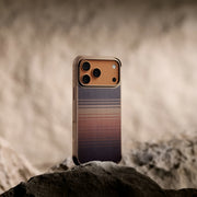 PITAKA ProGaurd Aramid Fibre Case for iPhone 17 Pro Max Phone case with gradient design on a rock