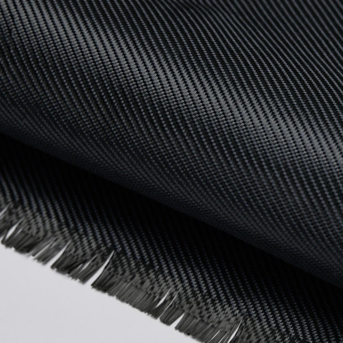 PITAKA Ultra‑Slim Aramid Fibre Case for iPhone 17 Pro Max Close-up of black fabric texture with a white background