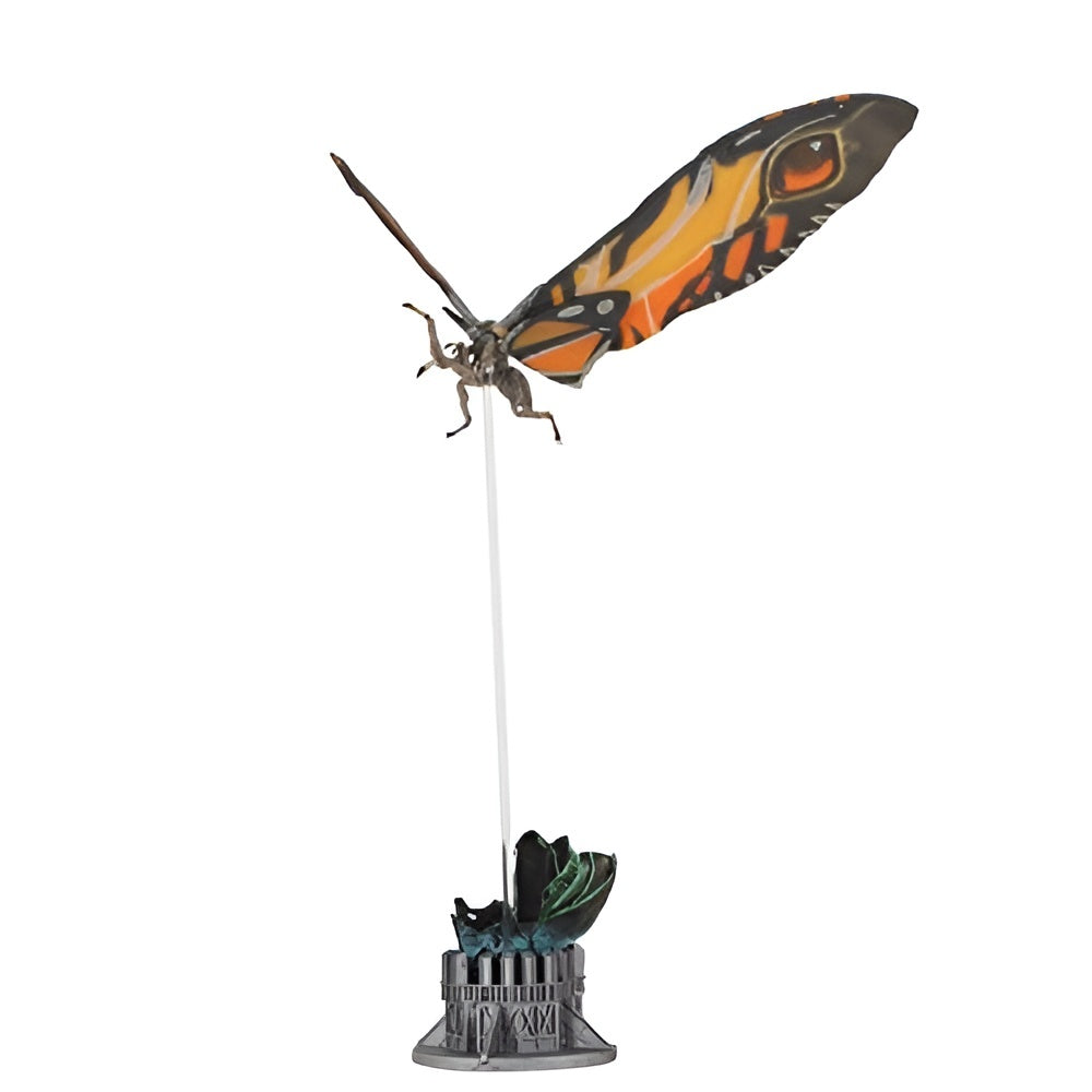 Butterfly figurine with orange wings on a white background