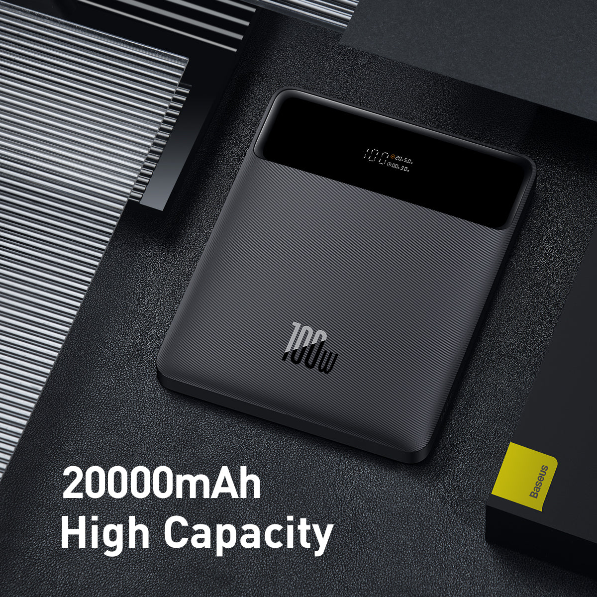 Black power bank with digital display on a dark surface, featuring the brand '100W'.