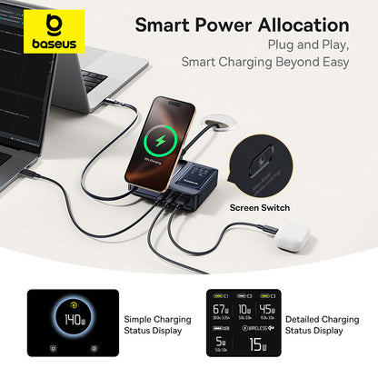 Baseus charging station with smartphone, laptop, and wireless earbuds on a white surface.