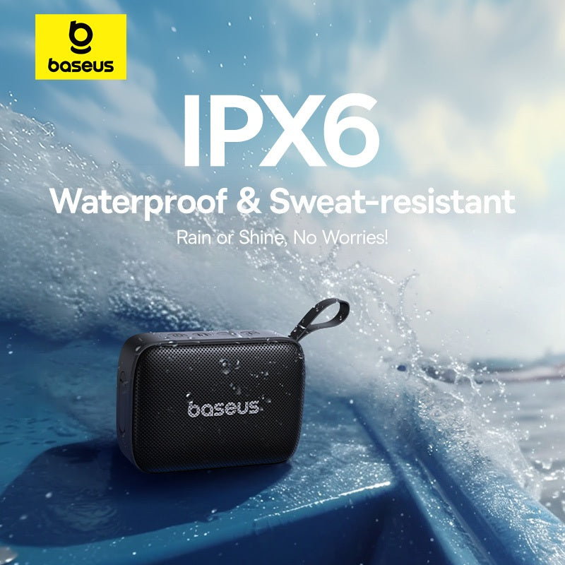 Baseus waterproof speaker with IPX6 rating being splashed by water, brand logo visible.