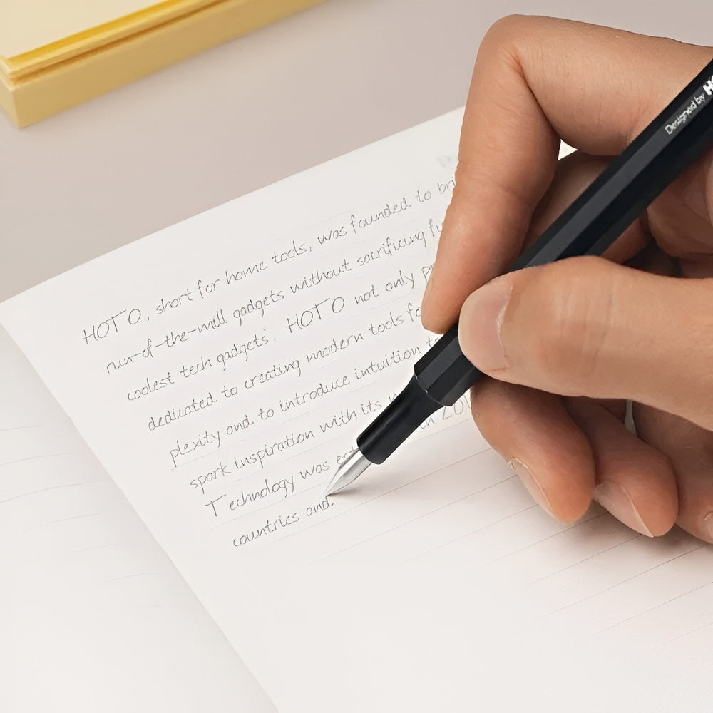 HOTO Pocket Precision Screwdriver SE Hand writing on a piece of paper with a pen