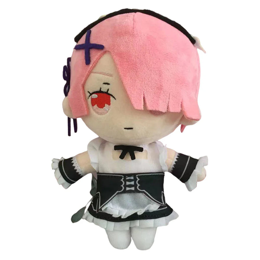Plush toy with pink hair and black and white outfit on a white background