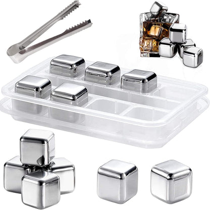 Set of stainless steel ice cubes with a tray and tongs on a white background