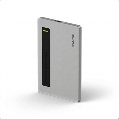 Sharge Disk Plus Ultra‑Slim SSD Enclosure (0.24", 10Gbps, 4TB, 100W PD)
Silver electronic device with a green indicator light on a white background