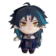 Plush toy of an animated character with dark hair and yellow eyes on a white background