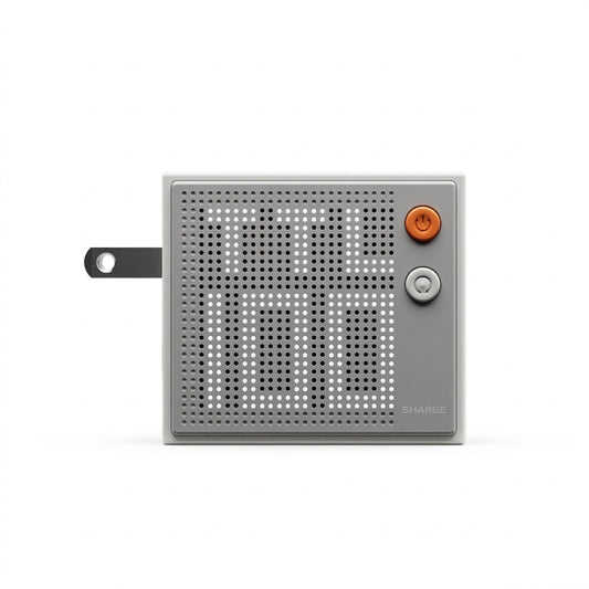 Sharge Pixel 100W GaN Charger (3×USB‑C, USB‑A, Dot‑Matrix Display) Small electronic device with a perforated design on a white background