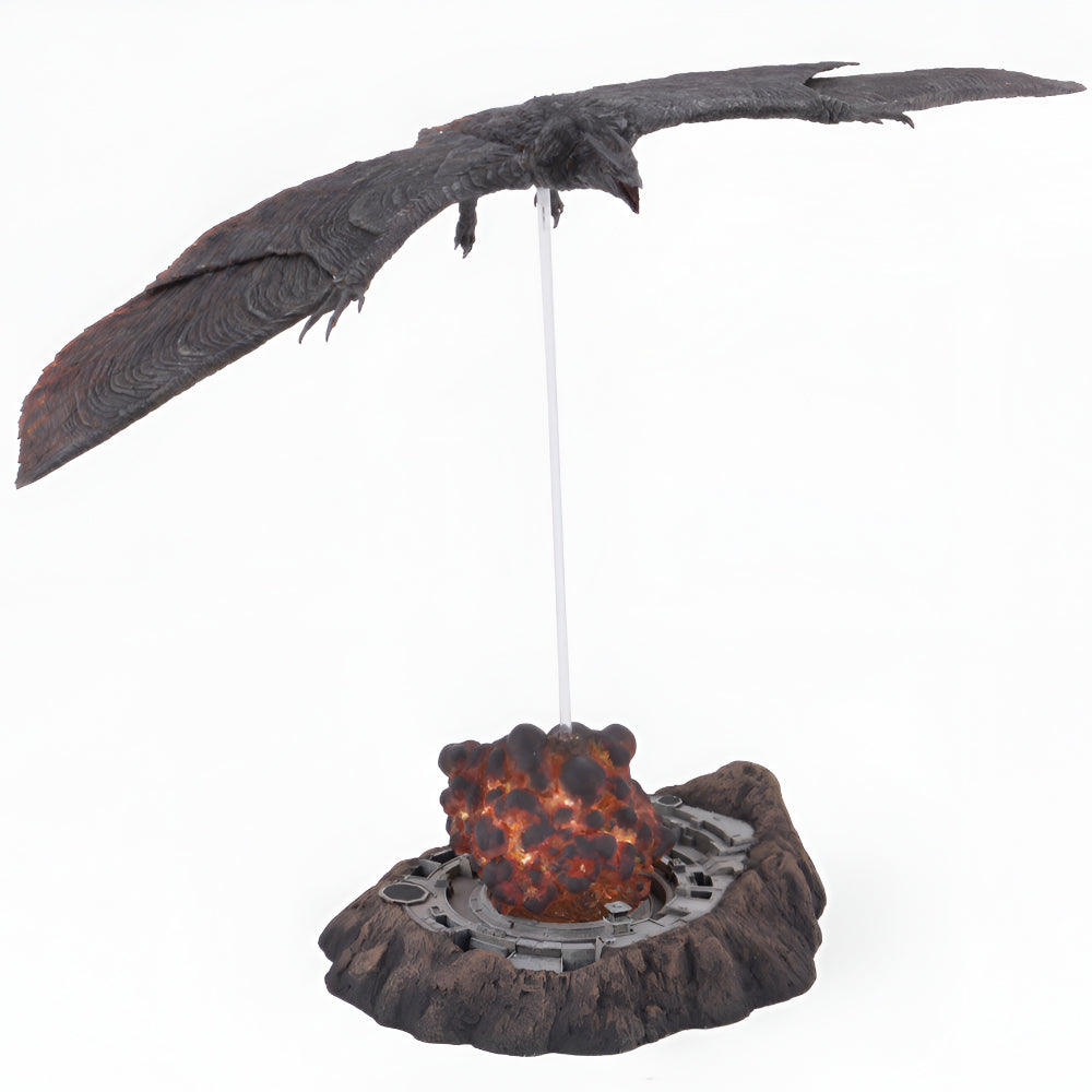 Decorative model of a dragon with a glowing egg on a white background