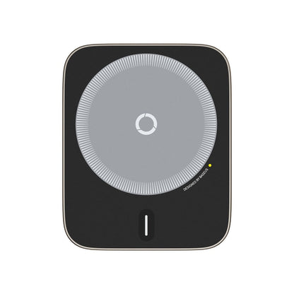 Black electronic device with circular gray center on a white background