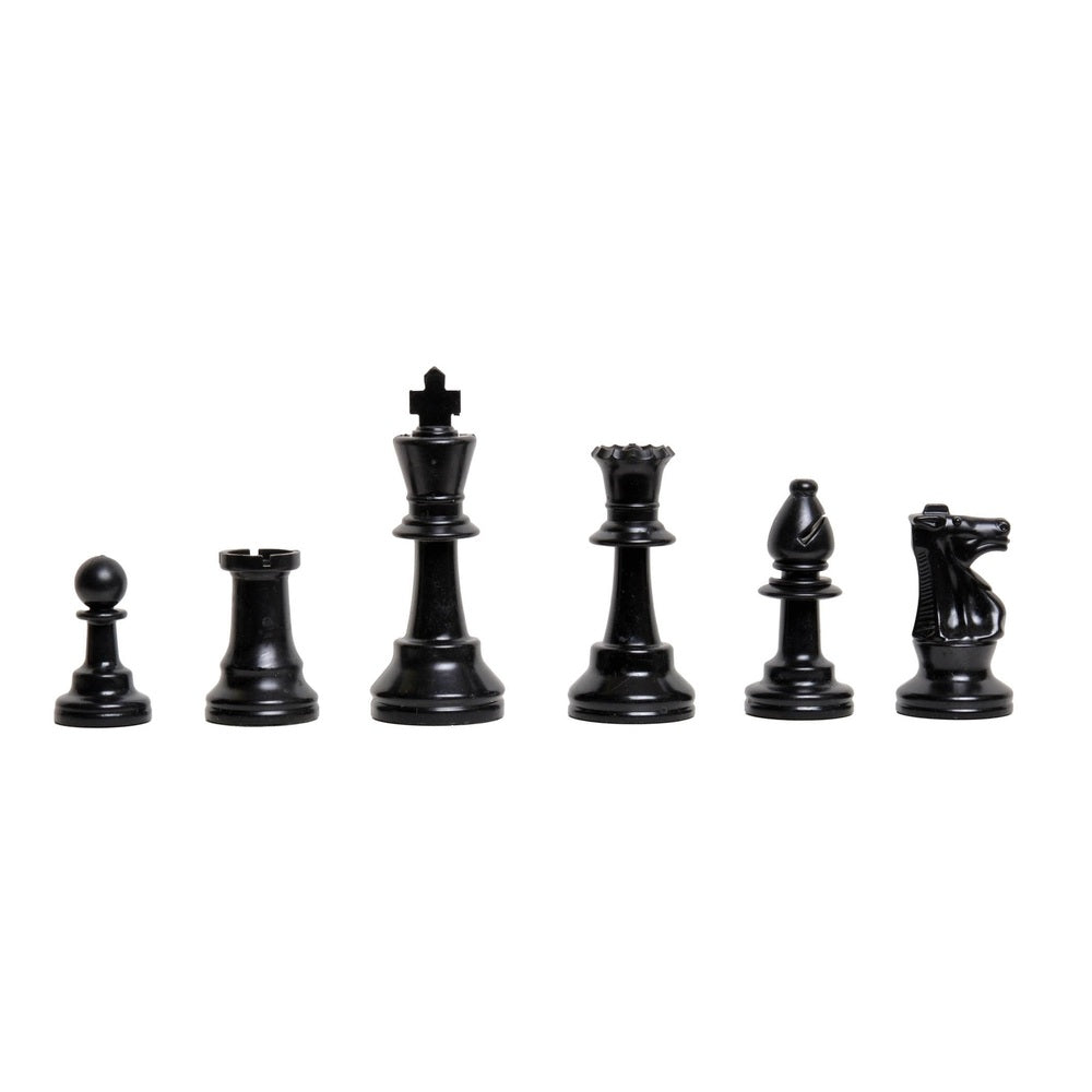 Set of black chess pieces on a white background