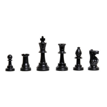 Set of black chess pieces on a white background