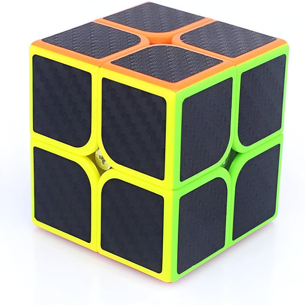 Rubik's Cube with black sides and green and orange edges on a white background