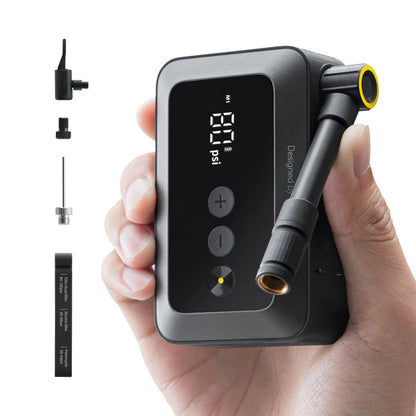 HOTO Air Pump Pocket, Hand holding a digital air pump with attachments on a white background