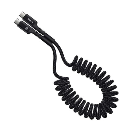 Black coiled cable with USB and Lightning connectors on a white background