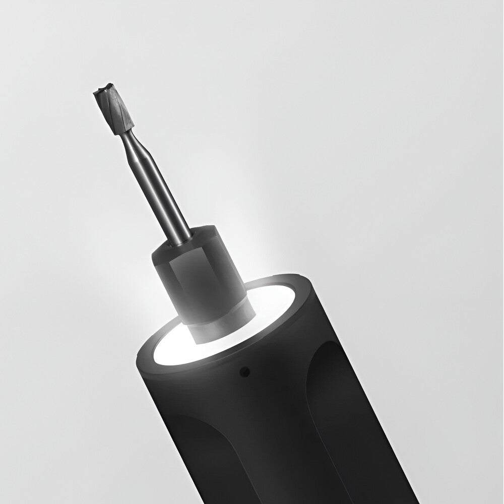 Black electric screwdriver on a light gray background