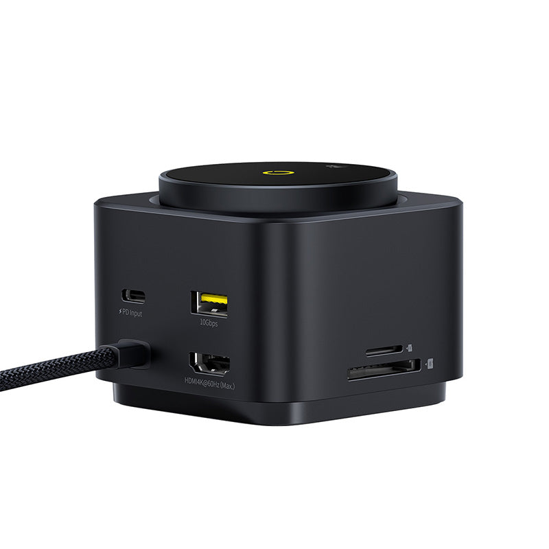 Black multi-port USB hub with various ports on a white background