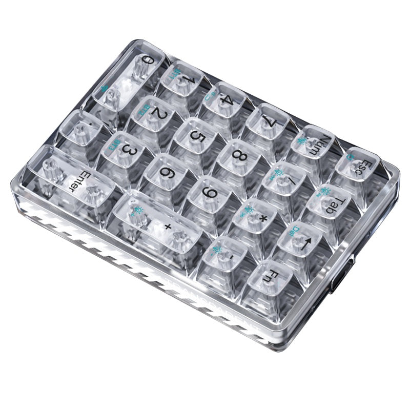 Transparent keyboard keycaps with silver frame on a white background