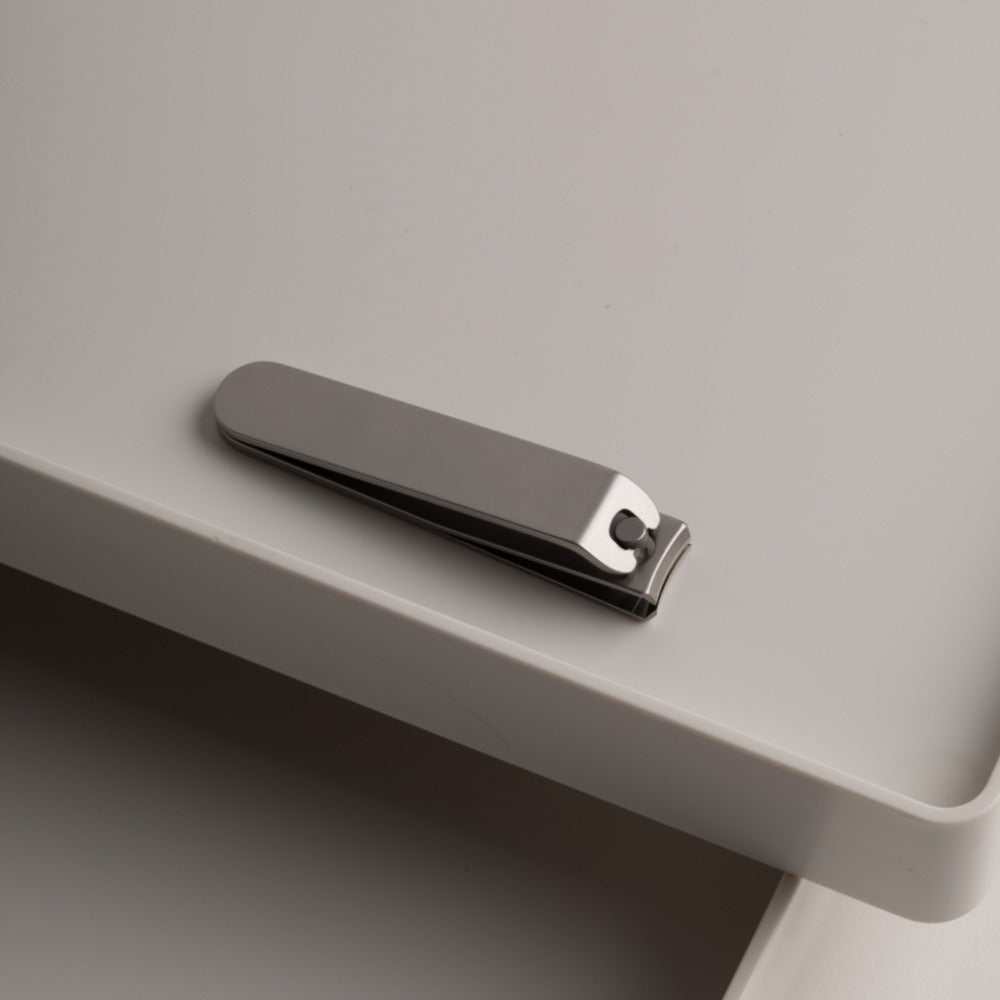 HOTO Clicclic Three-piece Nail Clipper, Nail clipper on a gray surface