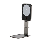 Phone stand with wireless charging pad on a white background