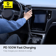 Person using a phone with a charging cable in a car, featuring Baseus branding.
