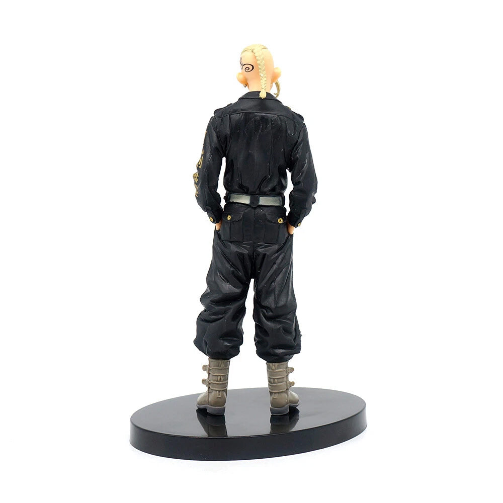Figure of a character in a black outfit on a white background