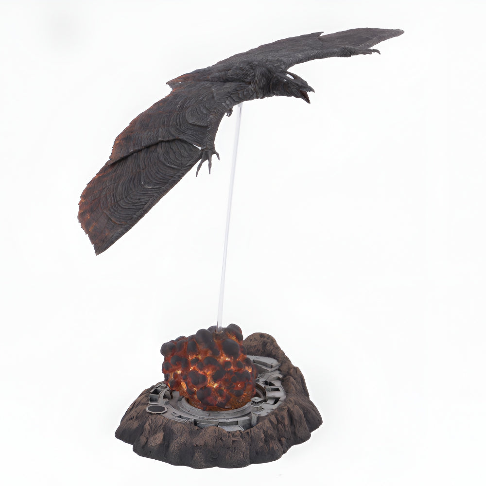 Decorative figure of a bird on a rock with lava, on a white background