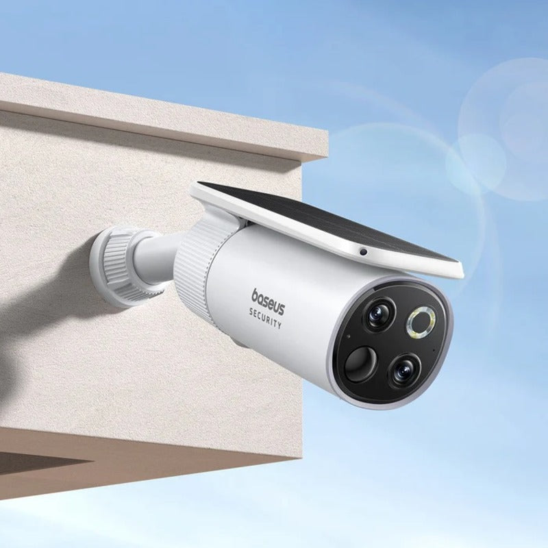 Baseus security camera mounted on a building exterior with a clear blue sky background