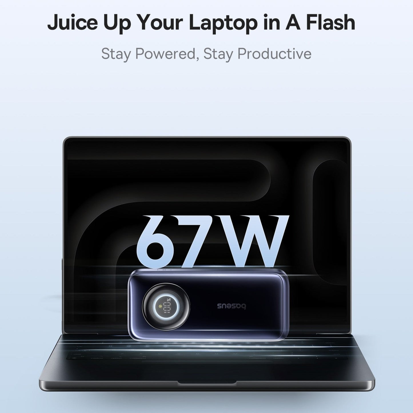 Laptop with a power adapter displaying '67W' on a light blue background.