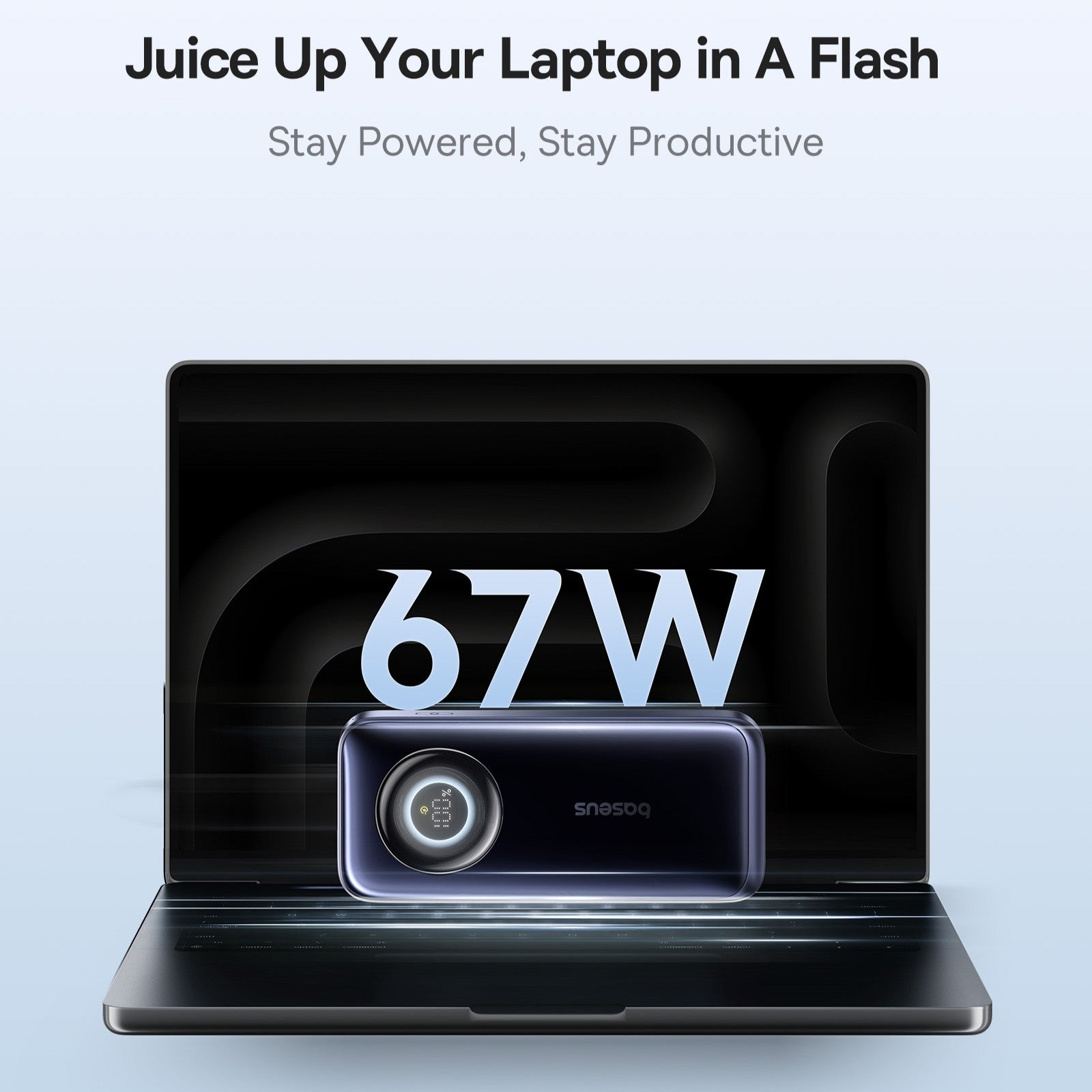Laptop with a power adapter displaying '67W' on a light blue background.