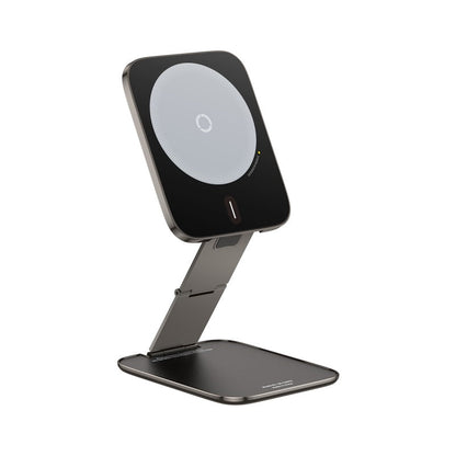 Black smartphone stand with wireless charging pad on a white background