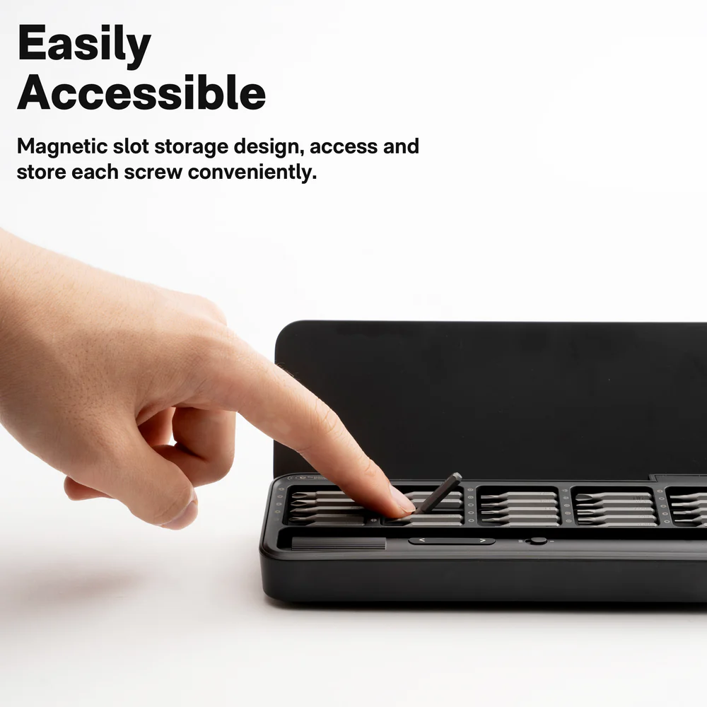 HOTO Electric Precision Screwdriver ADV 25 Bit Set Hand placing a screw into a black magnetic slot storage device with text 'Easily Accessible' above.