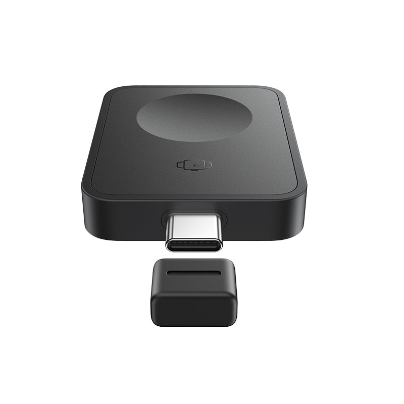 Black electronic device with a detachable component on a white background