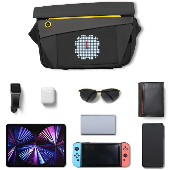 Divoom Pixoo Slingbag‑V Smart LED Sling Bag (4.7" Pixel Screen, App Control) Black crossbody bag with pixelated design, smartwatch, airpods, sunglasses, wallet, tablet, phone, and gaming console on a white background.