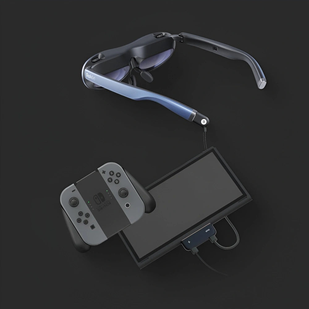 Rokid Hub USB‑C Adapter (Pass‑Through Charging, Switch Dock Mode, Dual USB‑C Out) Smart glasses with a controller and tablet on a dark background