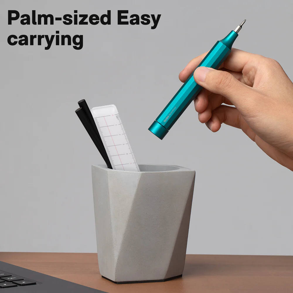 Hand holding a teal pen over a geometric gray pen holder with text 'Palm-sized Easy carrying'.
