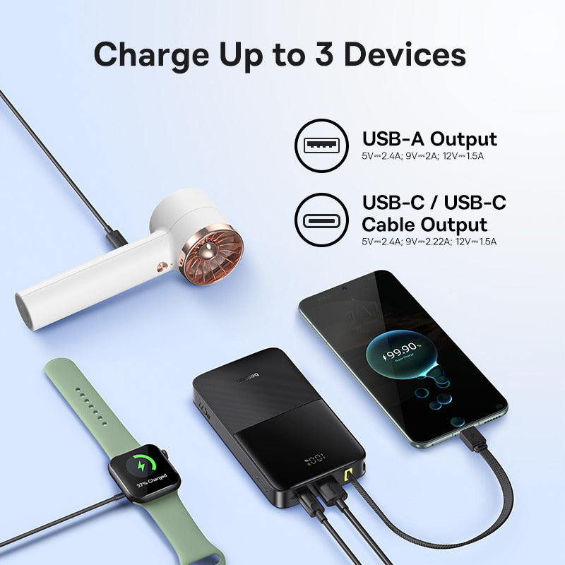 Charging station with multiple devices connected, including a phone, smartwatch, and hair dryer, on a light blue background.