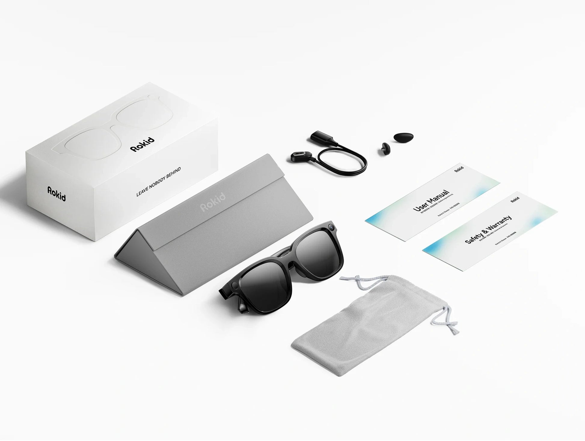Rokid AI Glasses Style (ChatGPT & Gemini, 12MP POV Camera, Real‑Time Translation) Packaged sunglasses with accessories on a white background