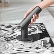 HOTO Cordless Spin Scrubber 6 Brush Head Set Person using a handheld cleaning tool on a soapy surface
