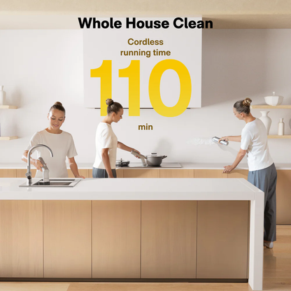 Three women cleaning a modern kitchen with a focus on cordless cleaning technology.