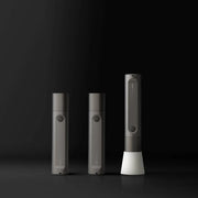 HOTO Flashlight Fit 280 Lumens Rechargeable Torch Three grey electronic devices on a black background