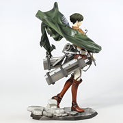 Figurine of a character with a large weapon on a white background