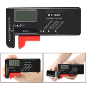 Digital battery tester with display and measurement capabilities, shown in use.